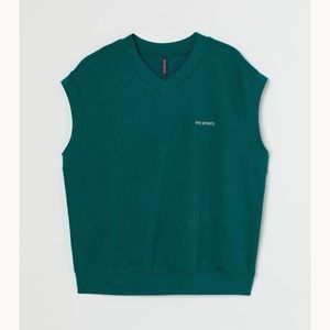 Woman’s Green Sweater Vest